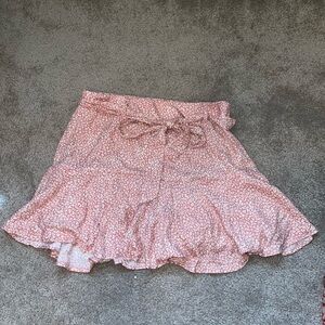 Size small skort. New without tags. Pink pattern.